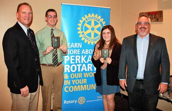 Neil Fosbenner, left, and Bob Hipp, right, present Student of the Month recognition from Perkasie Rotary to Pennridge High School students Chad Schaeffer and Kaitlyn Stevens.